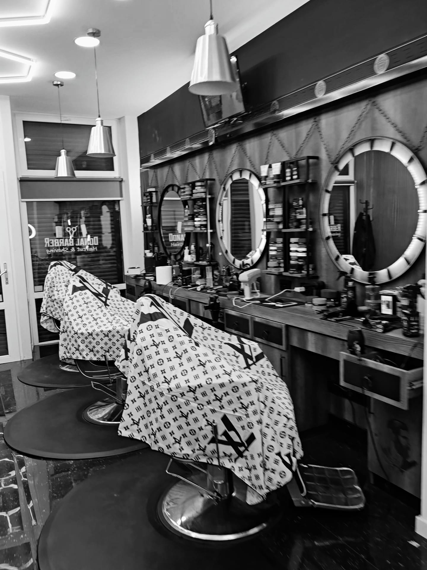 Tableau de tarifs Donal BarberShop au salon